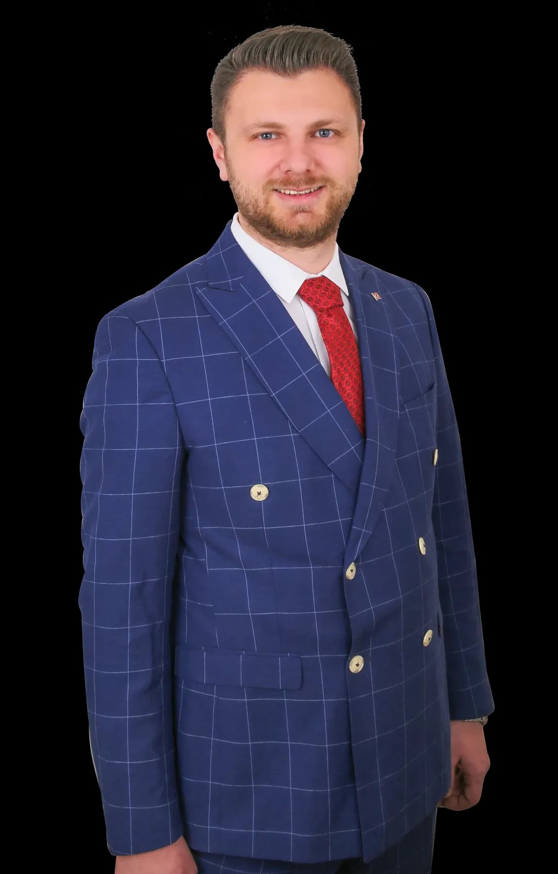 Studio portrait of Ömer Yazıcıoğlu in a navy suit
